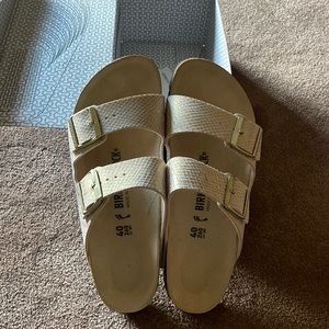 Birkenstock Arizona sandal with Snakeskin design and gold buckels.